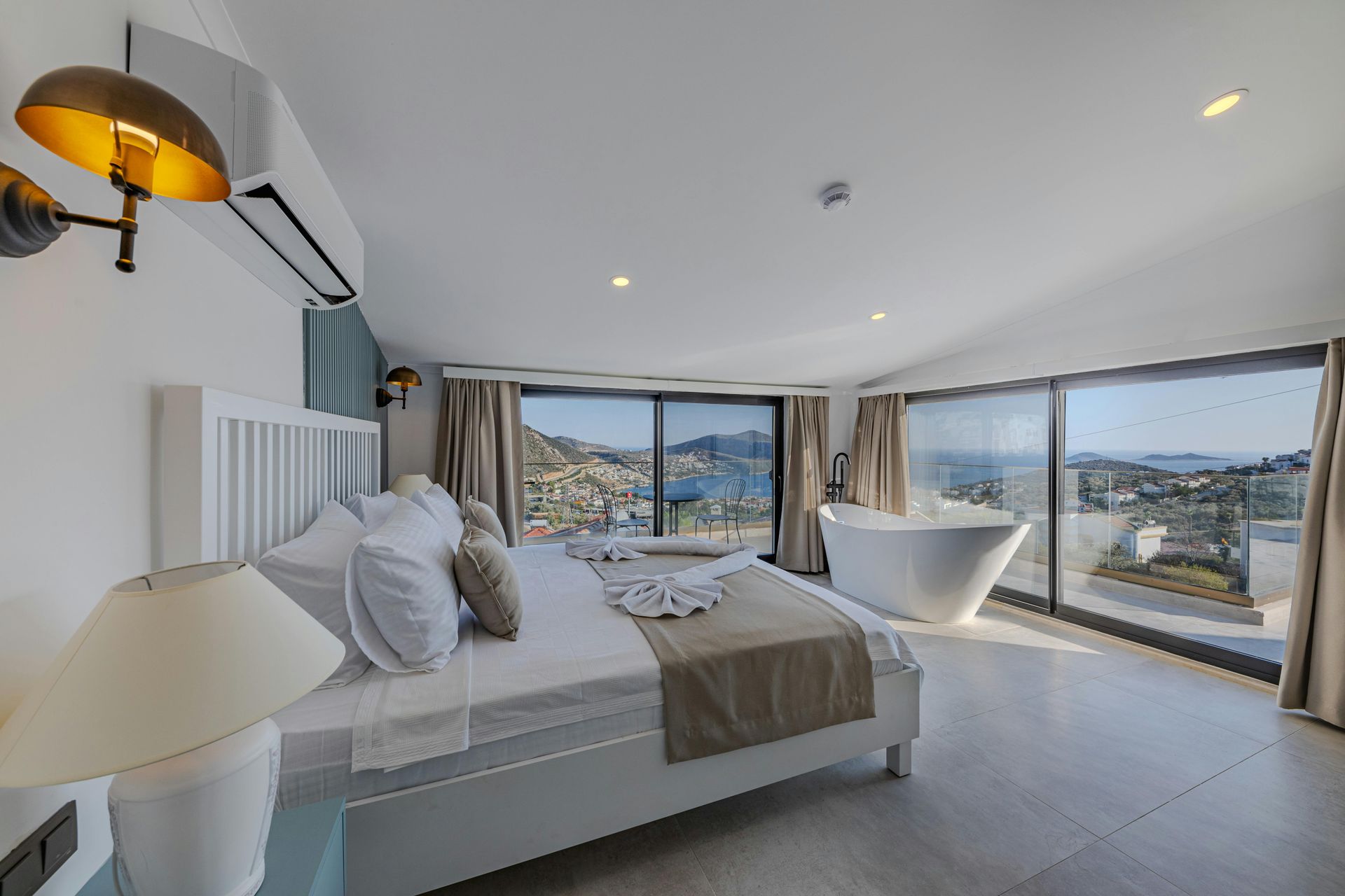 Serene primary suite with wall to wall windows Chesapeake Bay Virginia