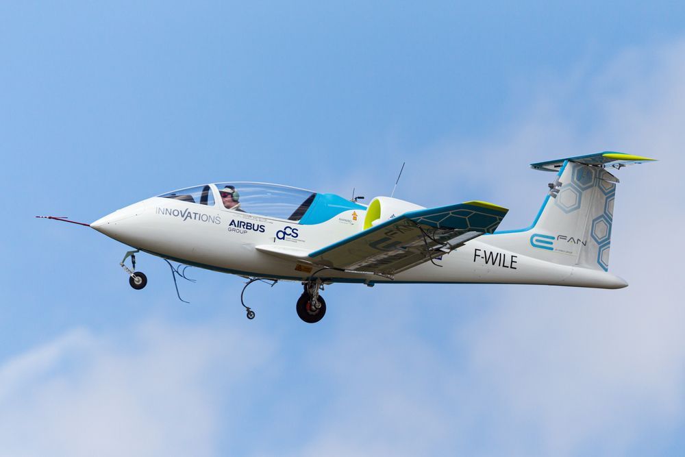 A small plane is flying in the sky.