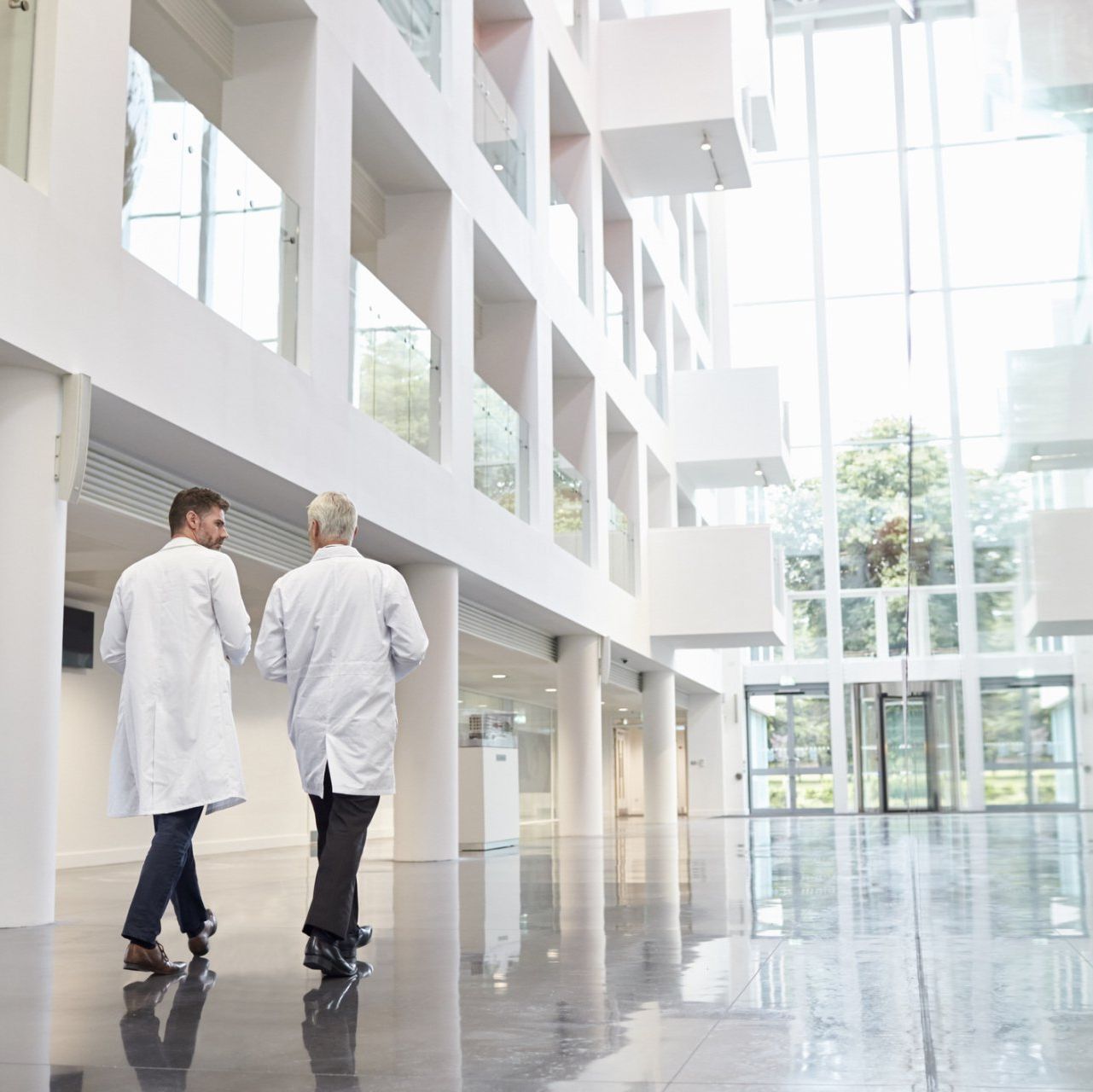 We can make your office look like this! Call us today for a professional cleaning Freshly Clean Corridor of business building