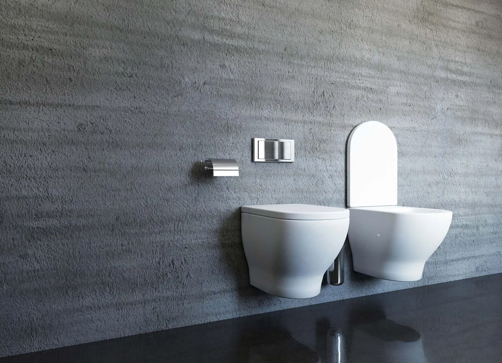 WC moderno sospeso in un bagno minimalista grigio con due lavabi affiancati.
