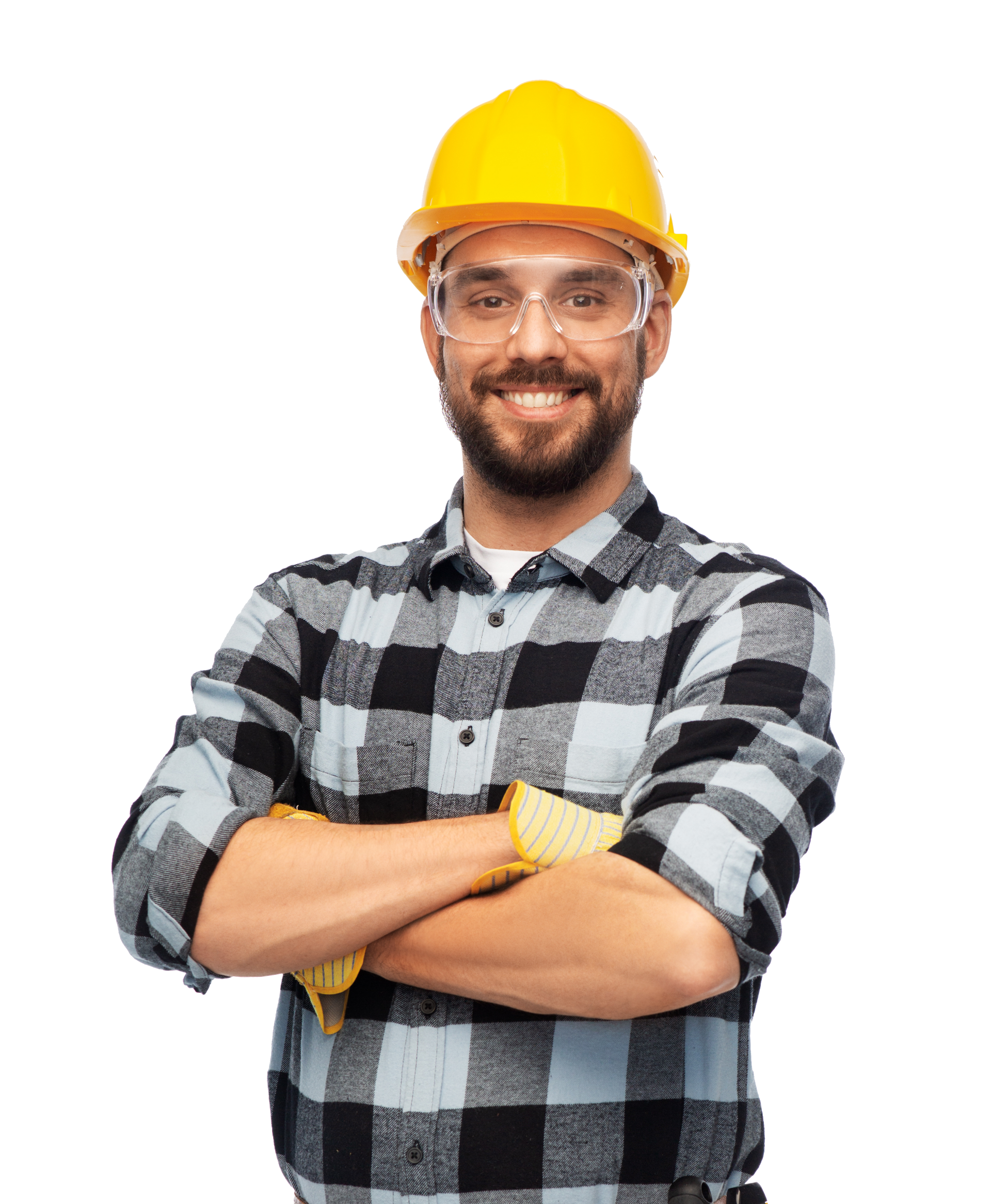 Smiling worker in yellow hard hat and plaid shirt with arms crossed