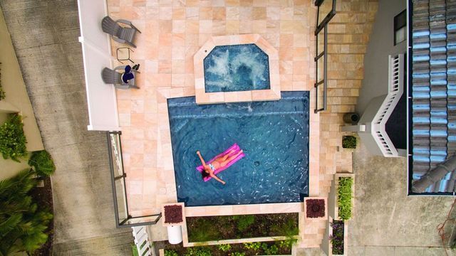 Woman On The Pool — Kailua, HI — Pacific Pool & Spa