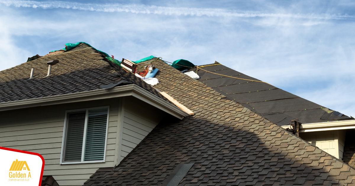 A house with a roof that is being repaired.