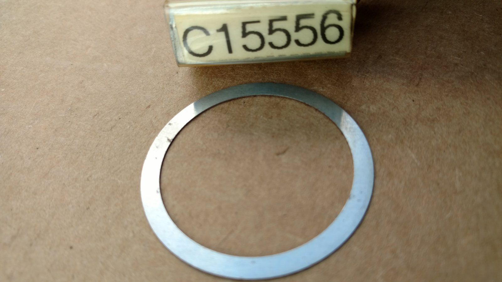 C15556 WASHER - SHIM .010 1.25x1.5x.010