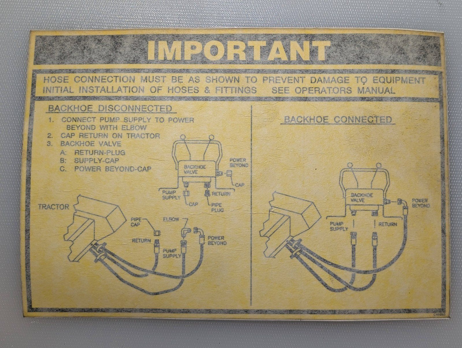 C46958 DECAL BACKHOE HOSE ROUTING