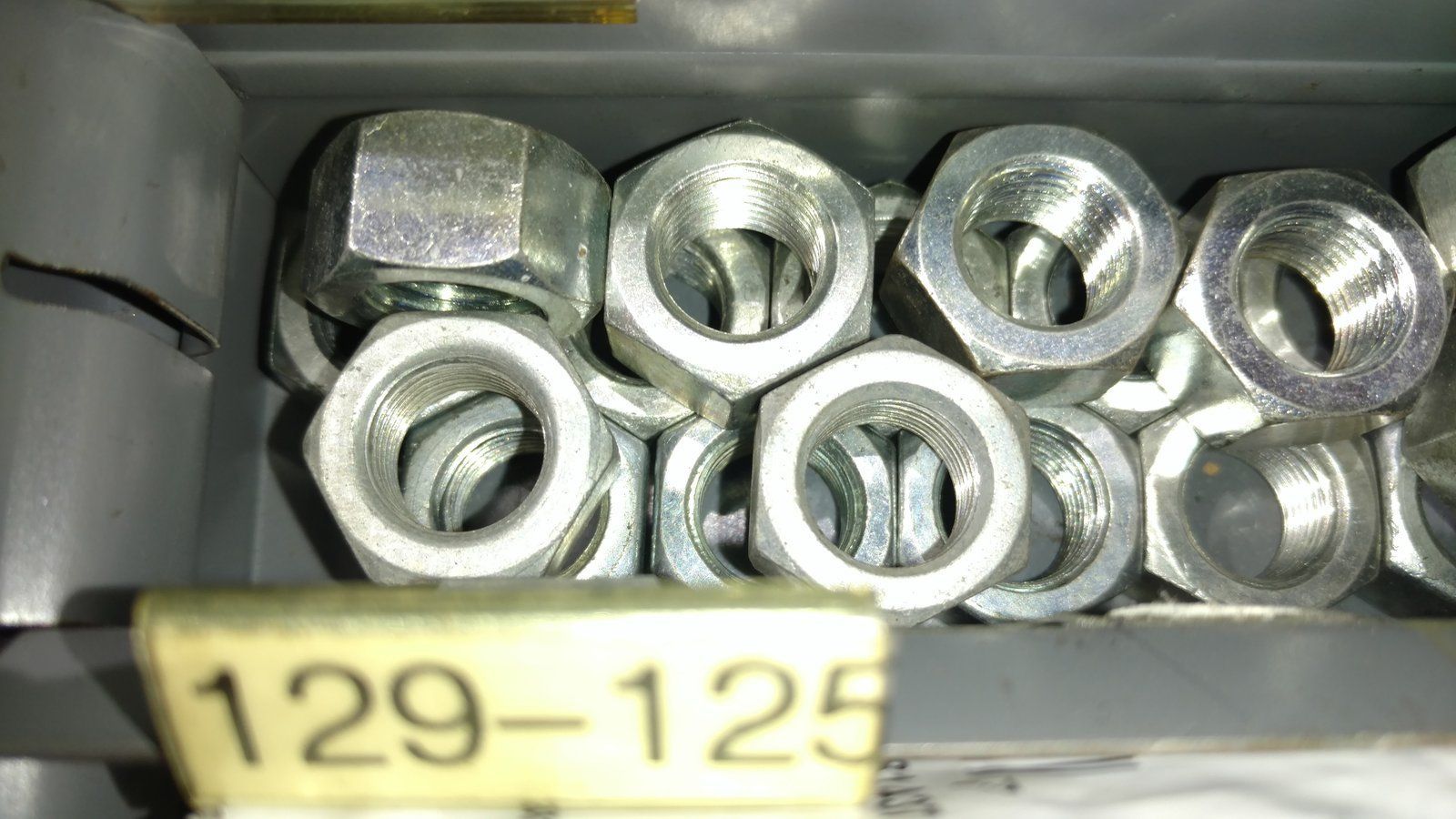 129-125 NUT 1/2-20 HEX ZP RH - Ingersoll/Case Tractor Part