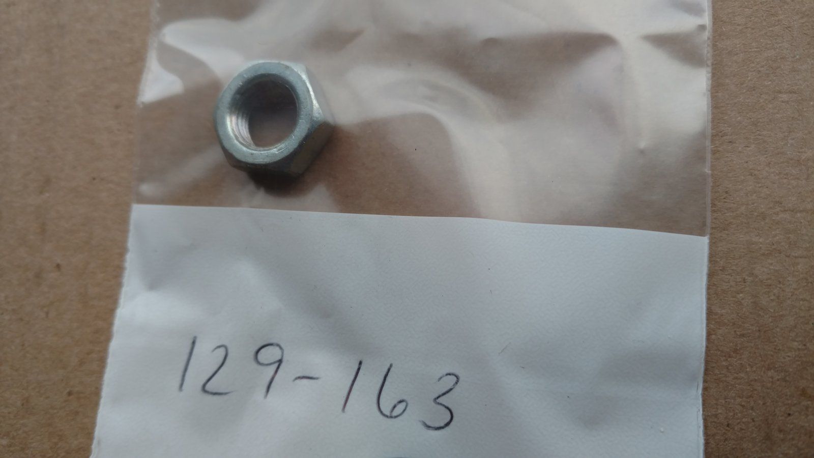129-163 NUT JAM 3/8-24 HX ZP - Ingersoll/Case Tractor Part
