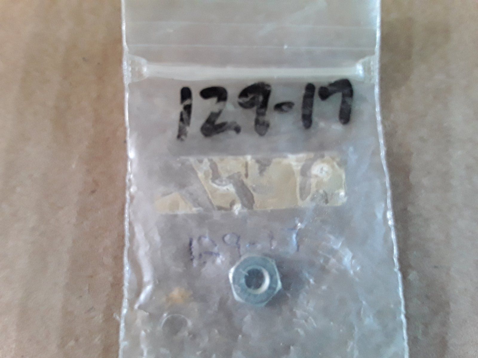 129-17 NUT 10-24 - Ingersoll/Case Tractor Part