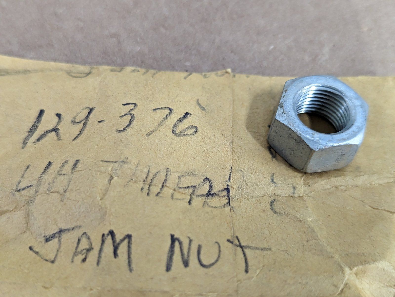 129-376 NUT JAM 12-20 - Ingersoll/Case Tractor Part