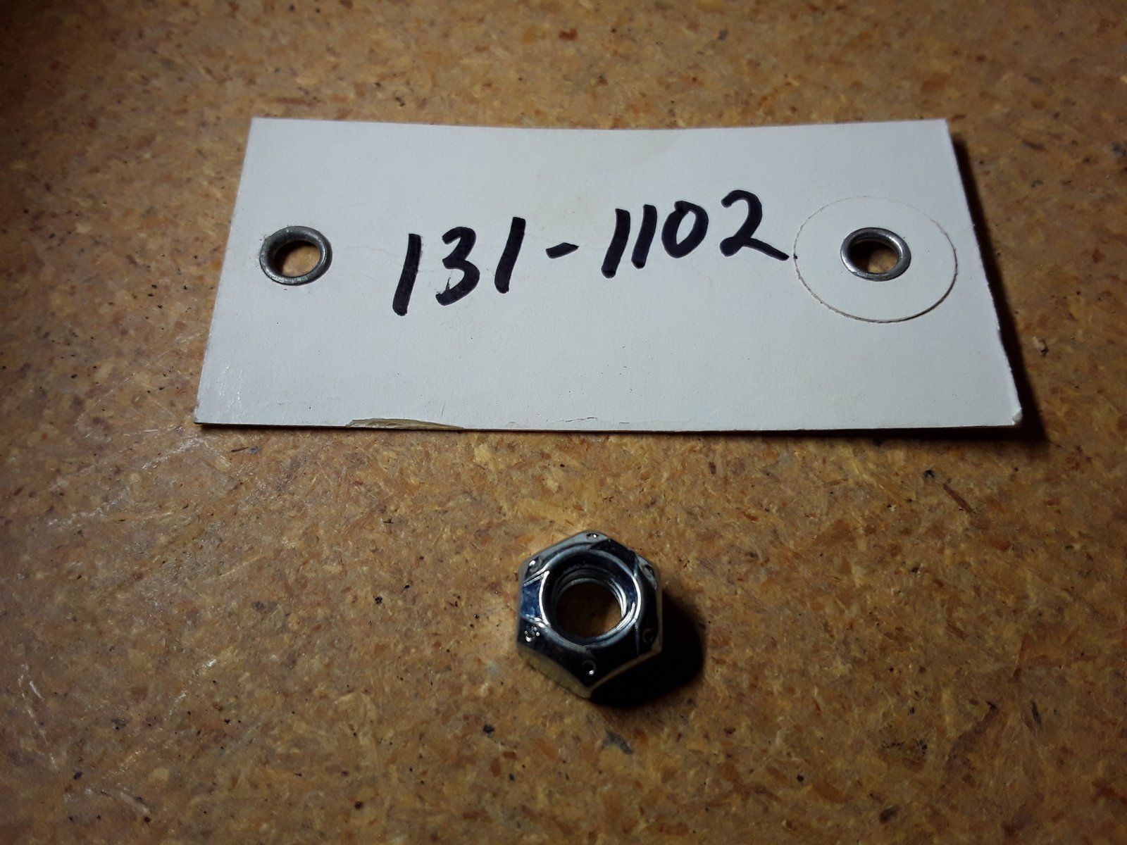131-1102 NUT 1/4-20 HX TOP LKGR A ZP - Ingersoll/Case Tractor Part