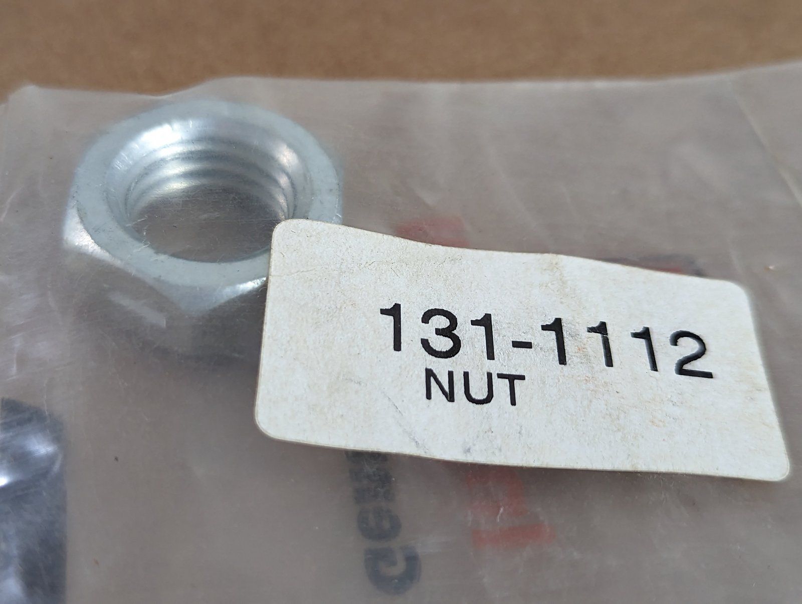 131-1112 NUT 3/4-10 HX JAM CTR LOCK ZP - Ingersoll/Case Tractor Part