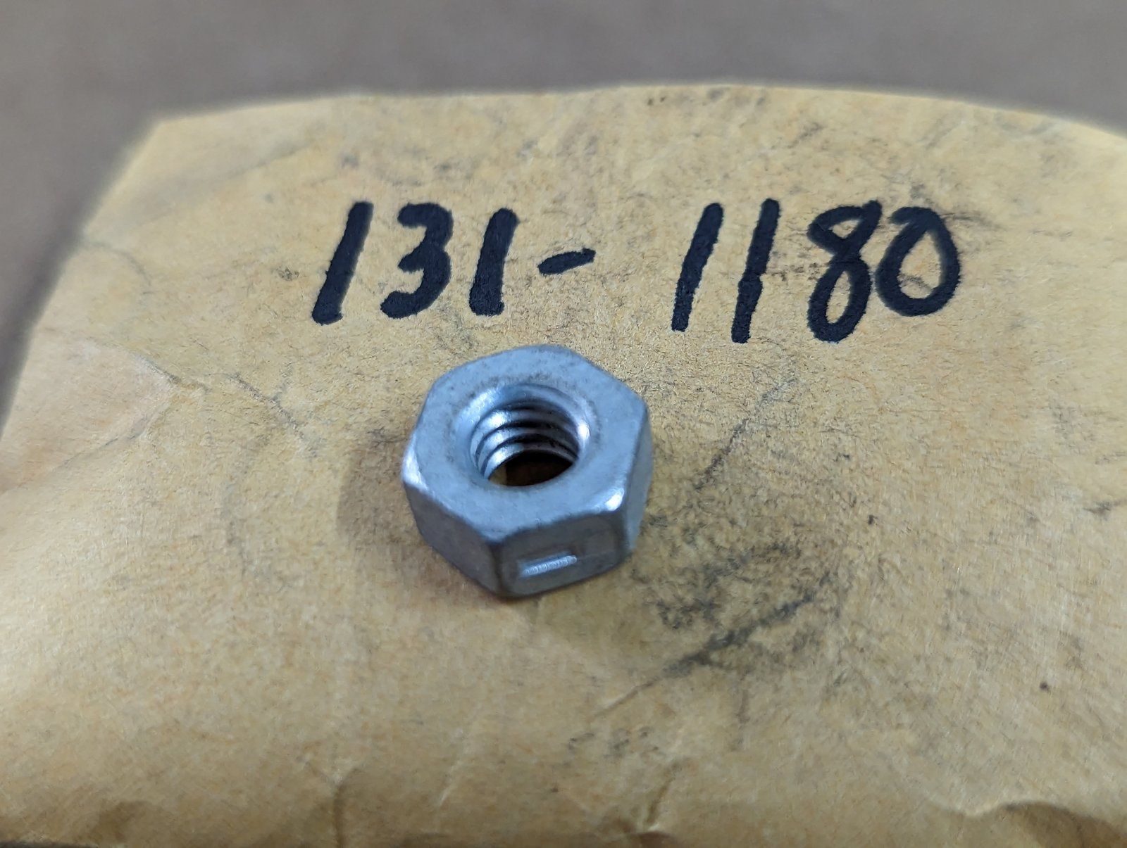 131-1180 NUT 1/4-20 HX CTR LK GR A ZP - Ingersoll/Case Tractor Part