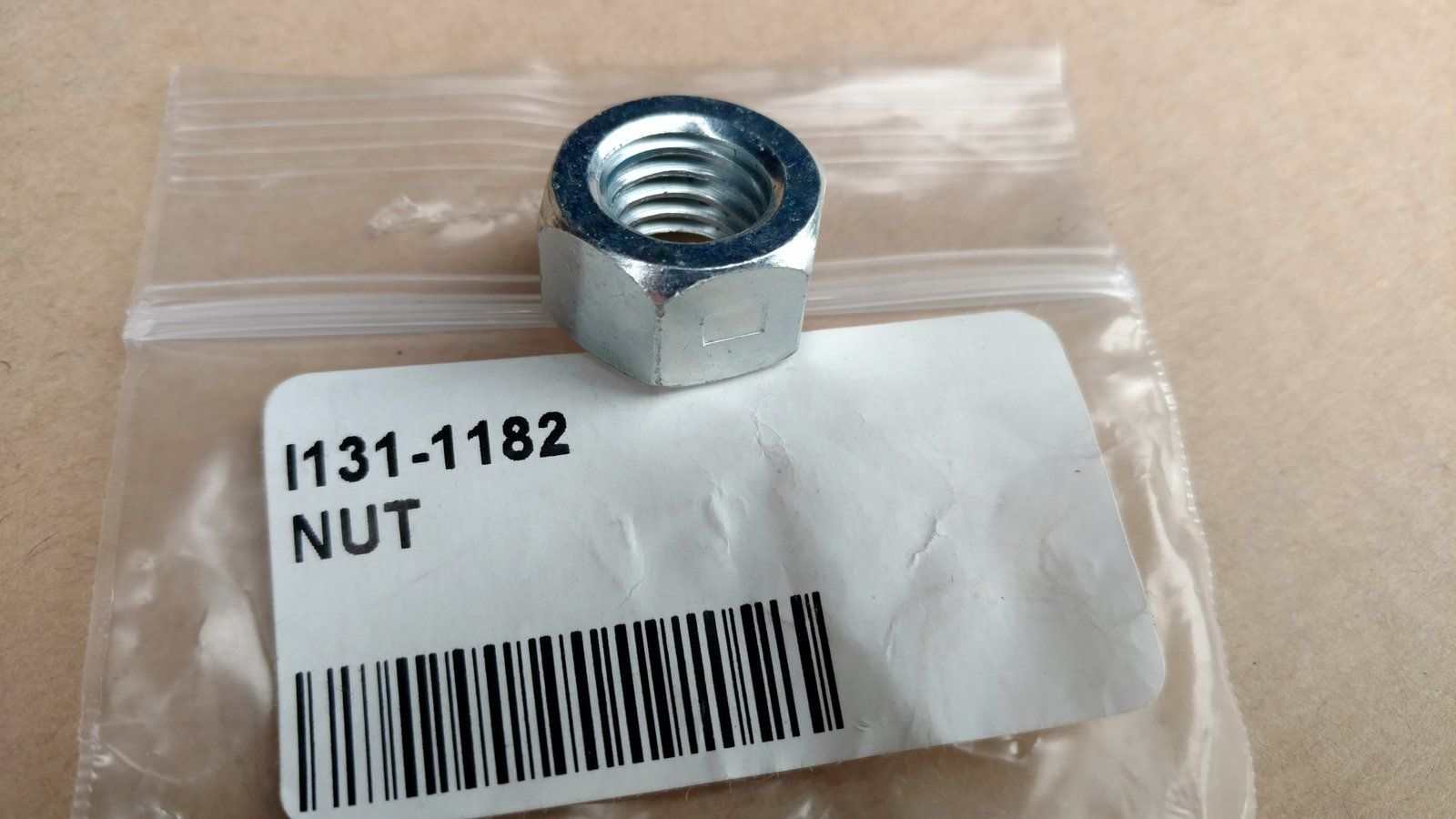 131-1182 NUT 1/2-13 HX CTR LK GR A ZP - Ingersoll/Case Tractor Part