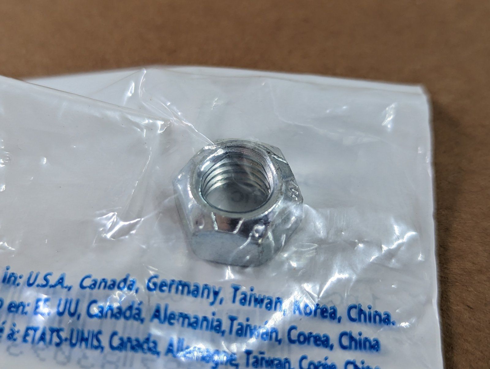131-1352 NUT 3/8-16 HEX FL TOP LK ZP - Ingersoll/Case Tractor Part