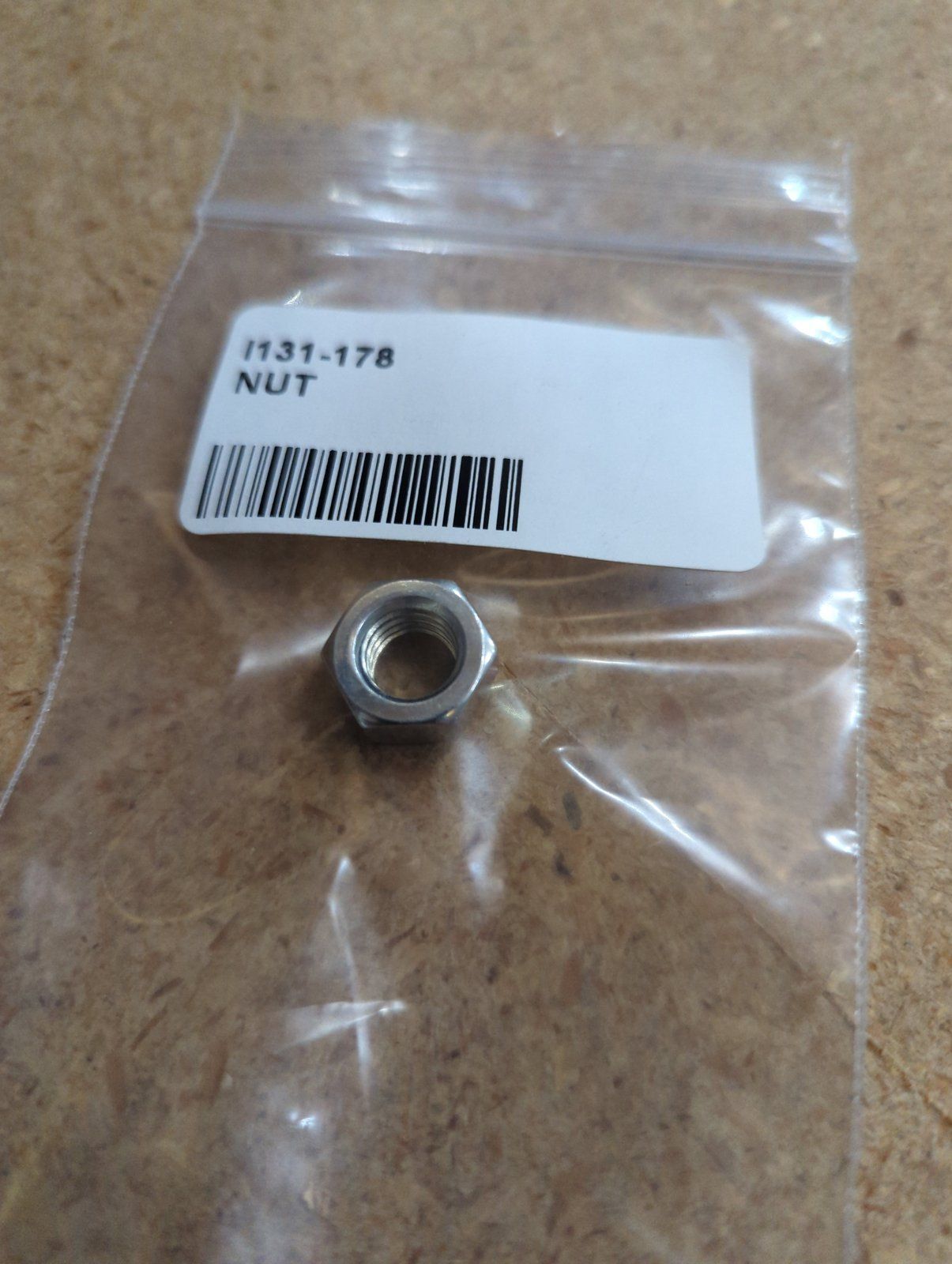 131-178 NUT 3/8-16 HX TOP LK GR A ZP - Ingersoll/Case Tractor Part