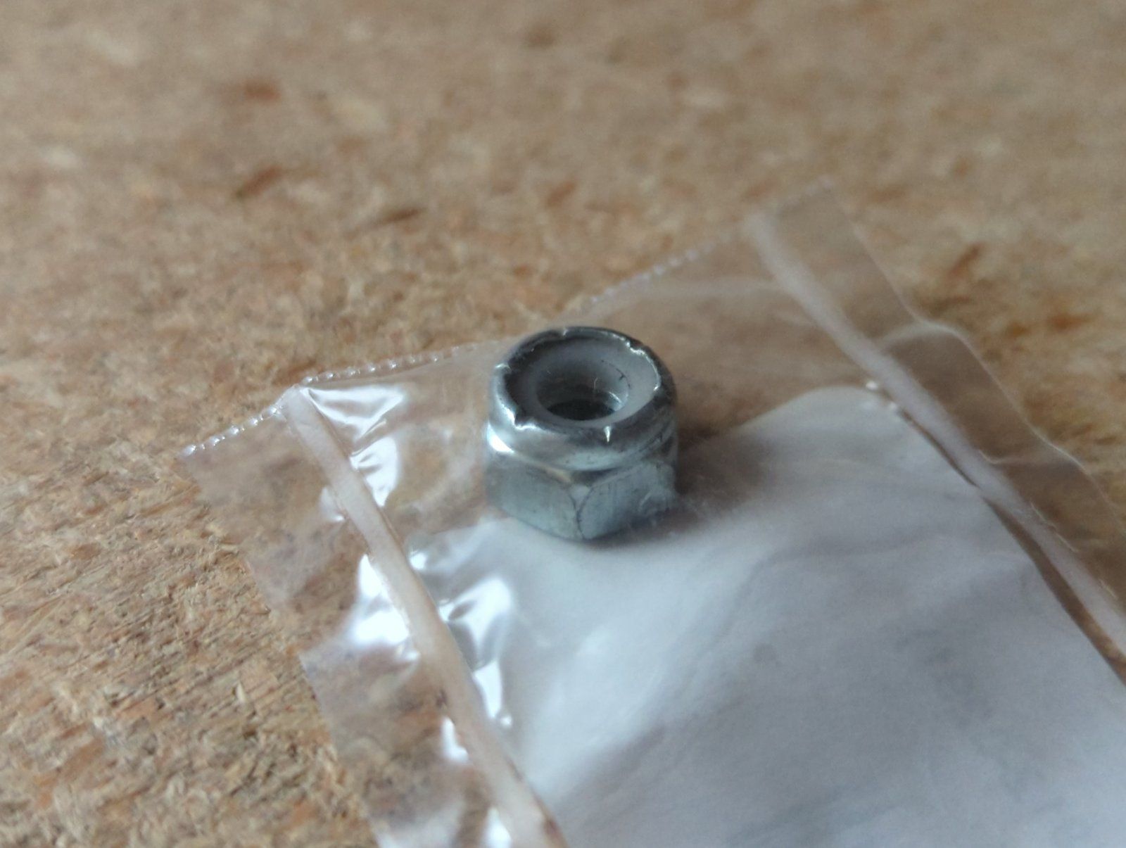 131-71 NUT 1/4-20 HX NYLON LK ZP C37734 - Ingersoll/Case Tractor Part
