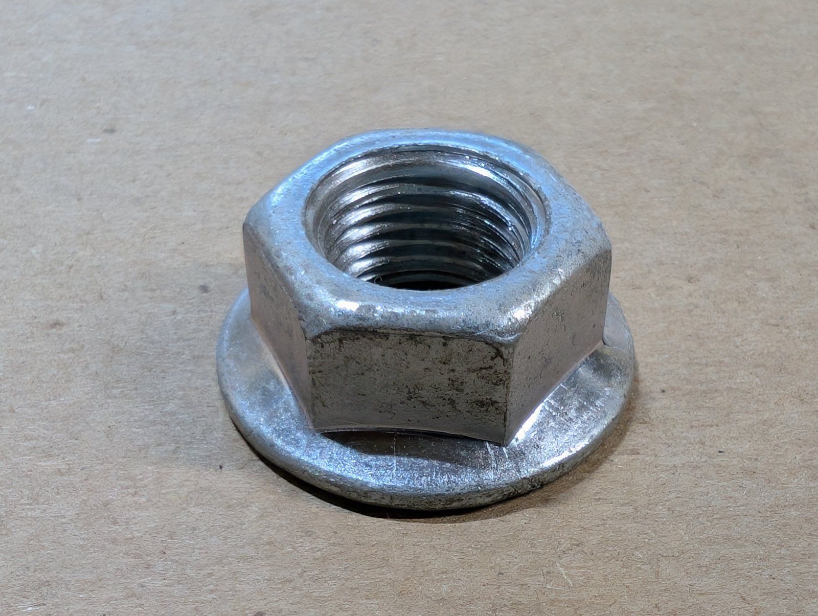 131-913 NUT 1/2-20 HX SERR FL LK ZP - Ingersoll/Case Tractor Part