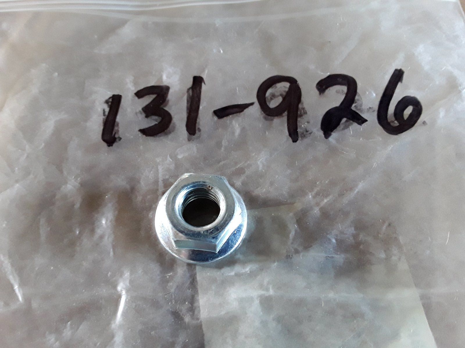 131-926 NUT 7/16-14 HX SERR FL LK ZP - Ingersoll/Case Tractor Part