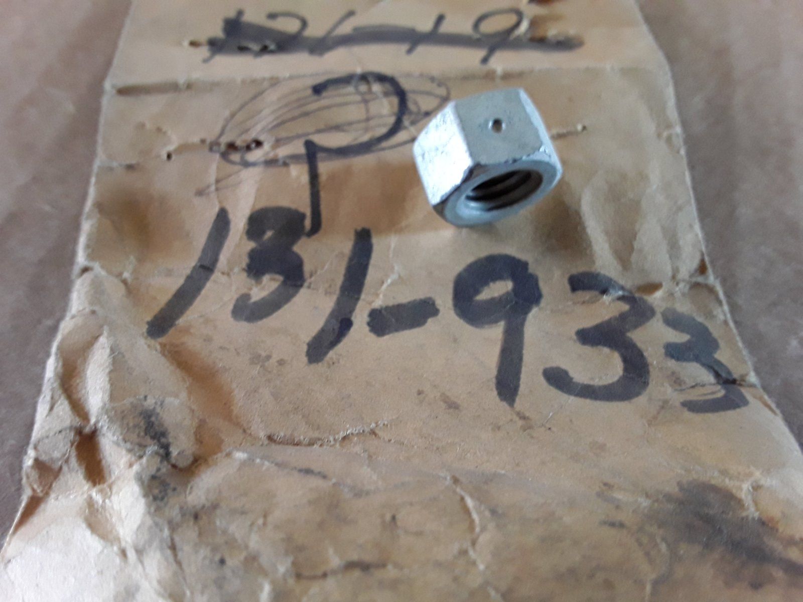 131-933 SUB TO: 131-1181 NUT 3/8-16 HX CTR LK ZP` NUT 3/8 LOCK - Ingersoll/Case Tractor Part