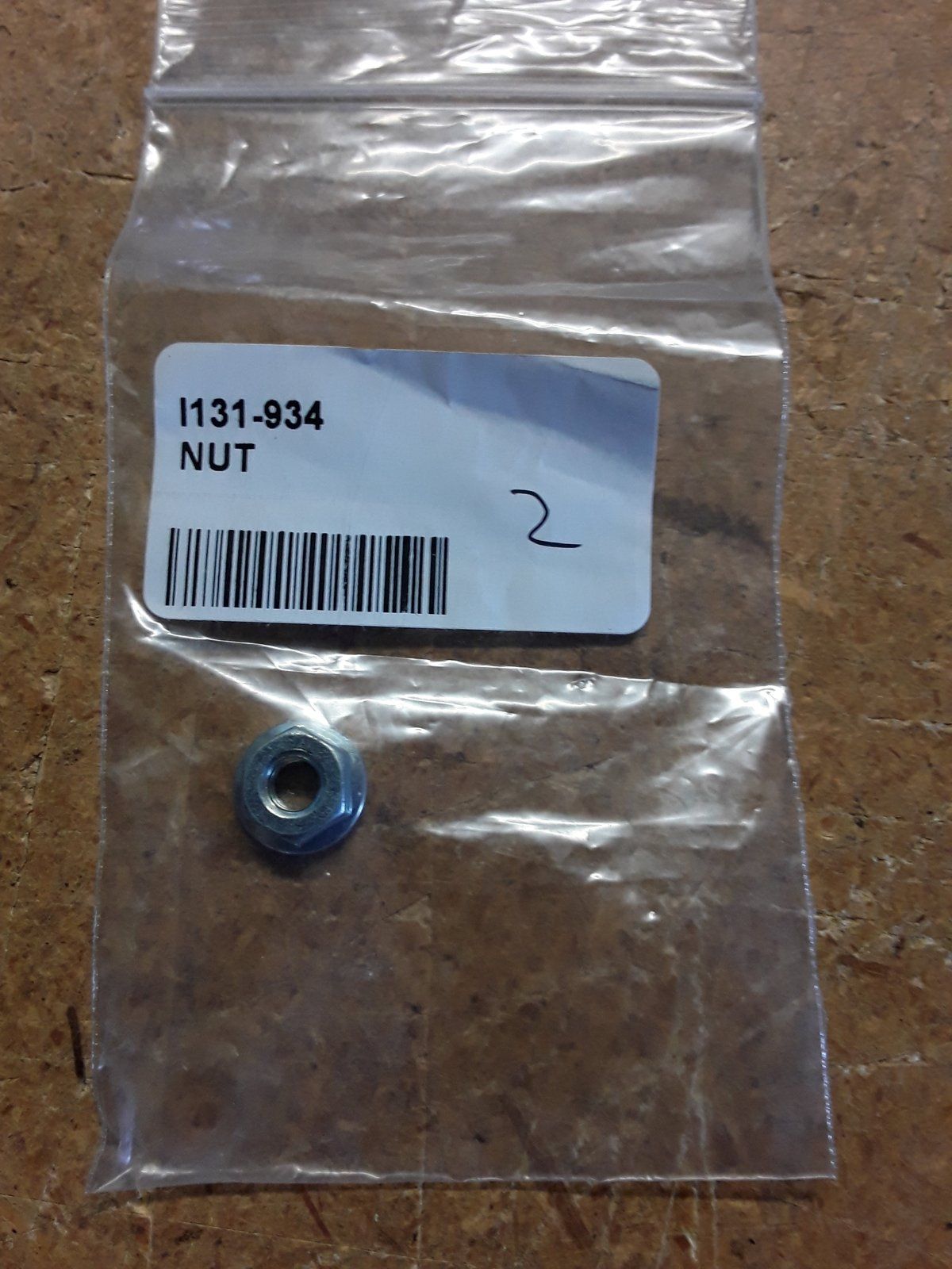 131-934 NUT 1/4-20 HX SERR FLANGE - Ingersoll/Case Tractor Part