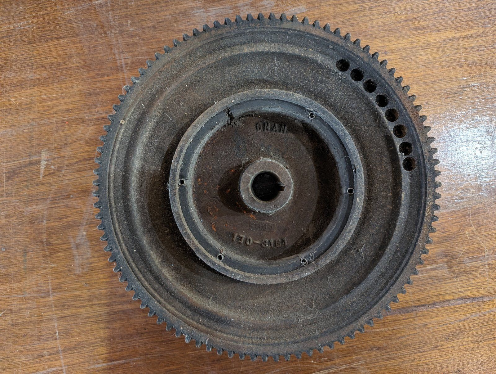 170-3161 USED ONAN FLY WHEEL C24943 - Ingersoll/Case Tractor Part