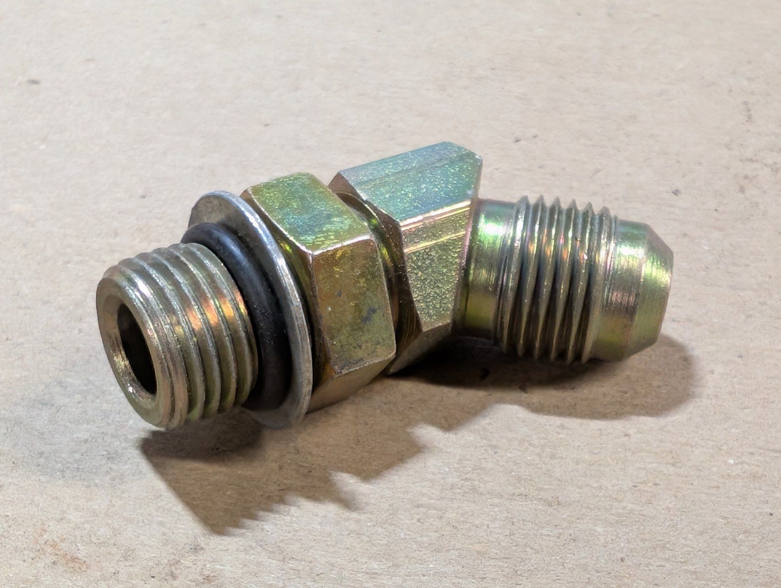 218-5135 FIT'G 45 ADJ ELBOW 3/8T37F X - Ingersoll/Case Tractor Part