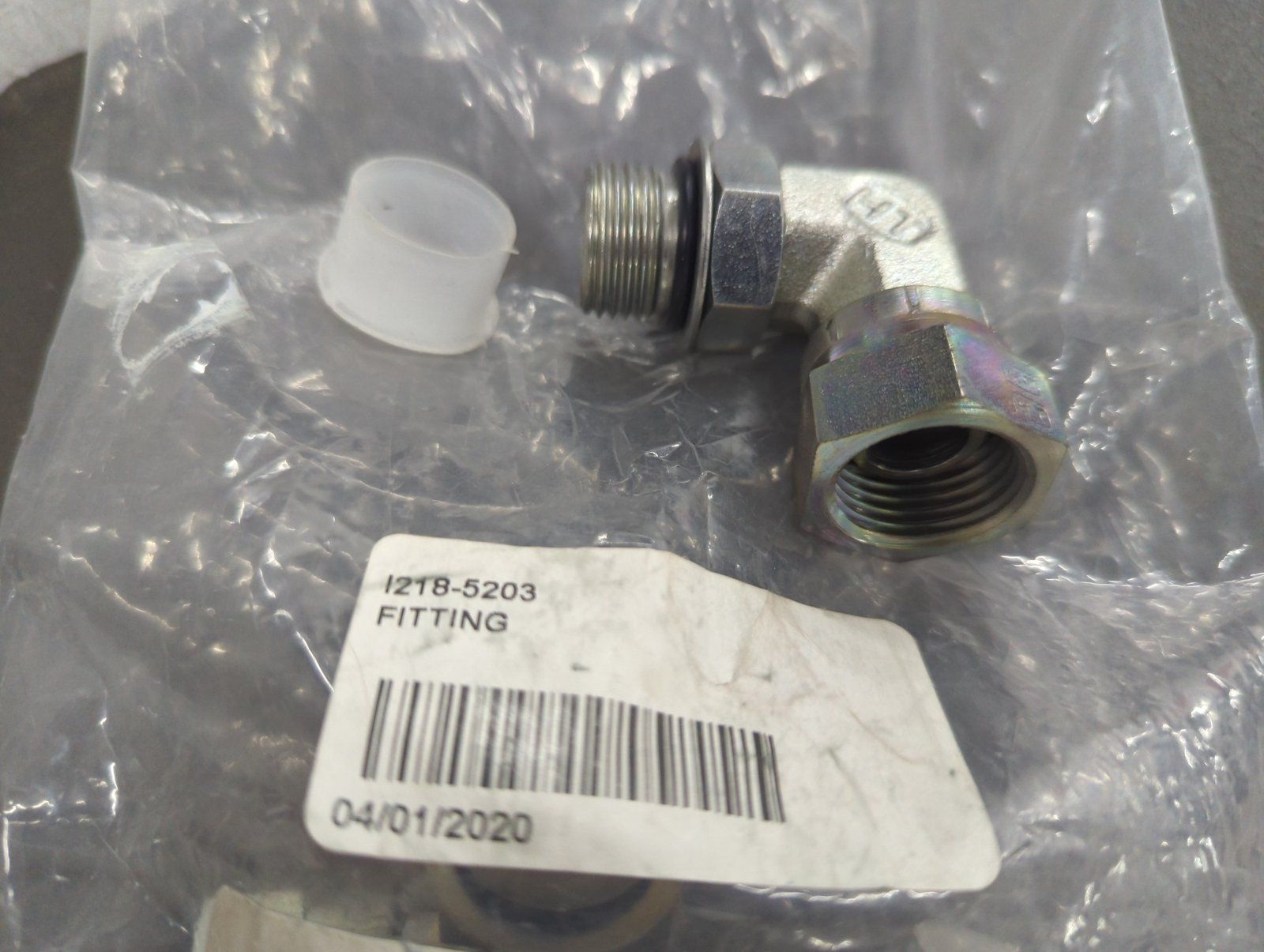 218-5203 FITTING - 90 SWIVEL 3/4