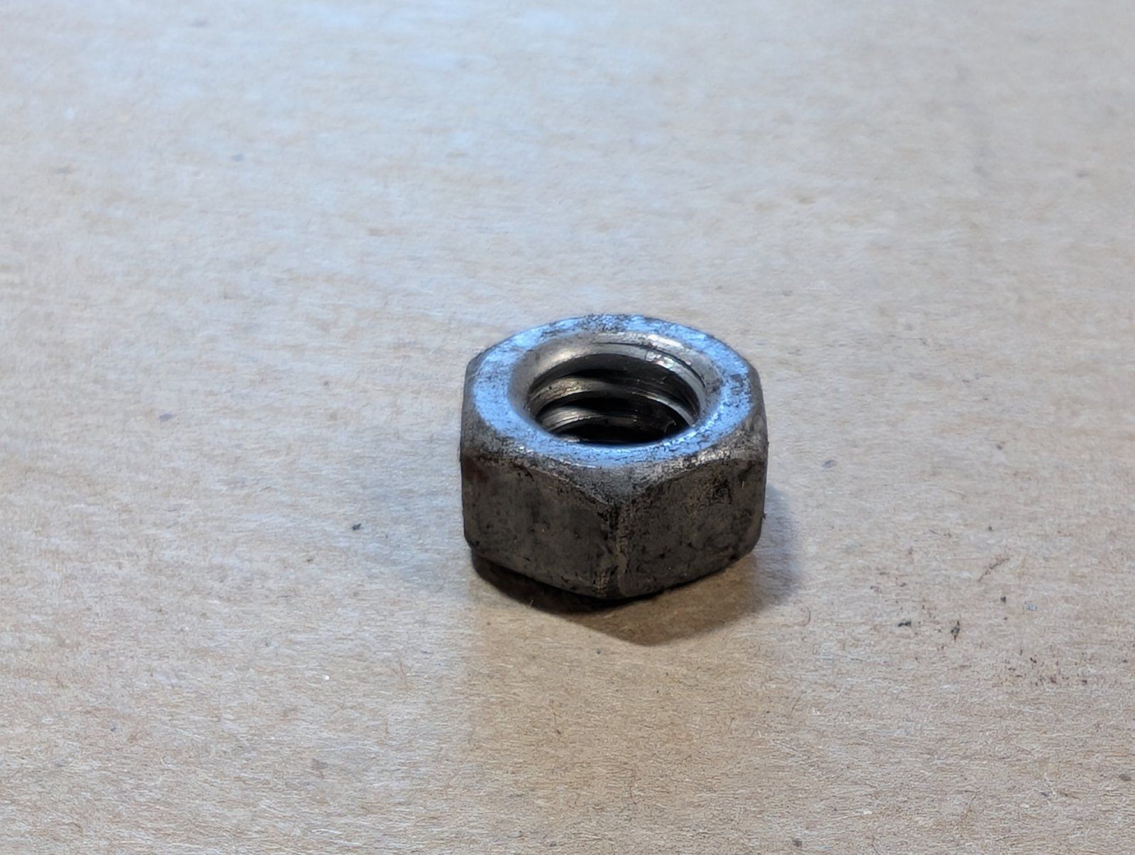 25-105 NUT 5/16-18 HEX PLAIN - Ingersoll/Case Tractor Part
