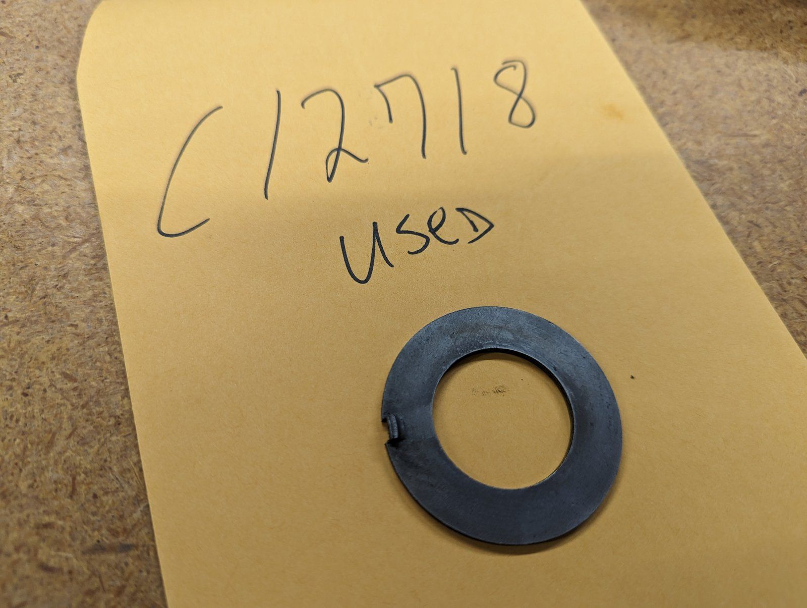 C12718 USED WASHER-THRUST W/TANG DIFF - Ingersoll/Case Tractor Part