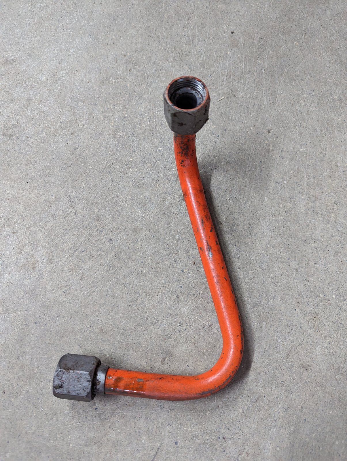 C16687 USED TUBE-VALVE TO LOWER MOTOR - Ingersoll/Case Tractor Part