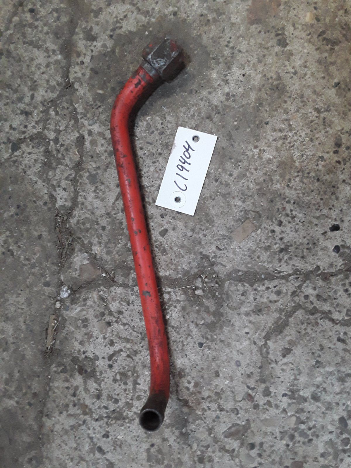C19404 USED TUBE - BYPASS TO RETURN LINE K-19 - Ingersoll/Case Tractor Part