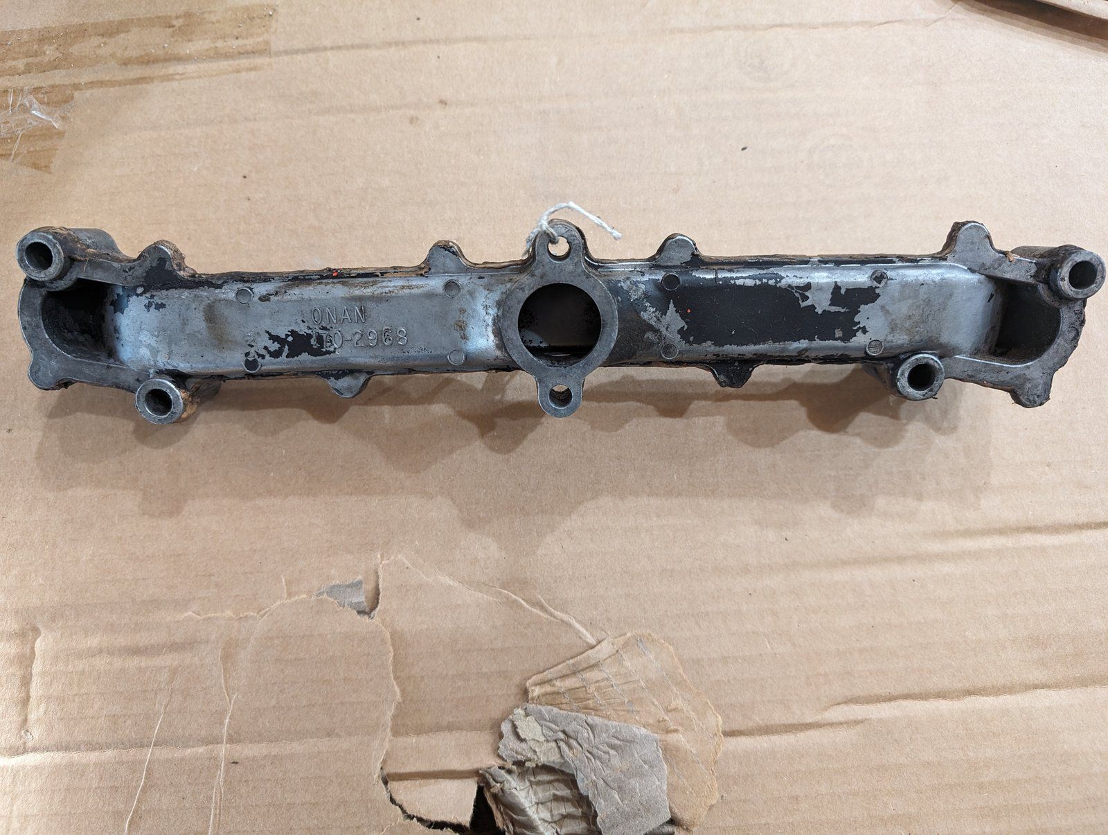 C20390 USED MANIFOLD ONAN 170-2968 170-2969 - Ingersoll/Case Tractor Part