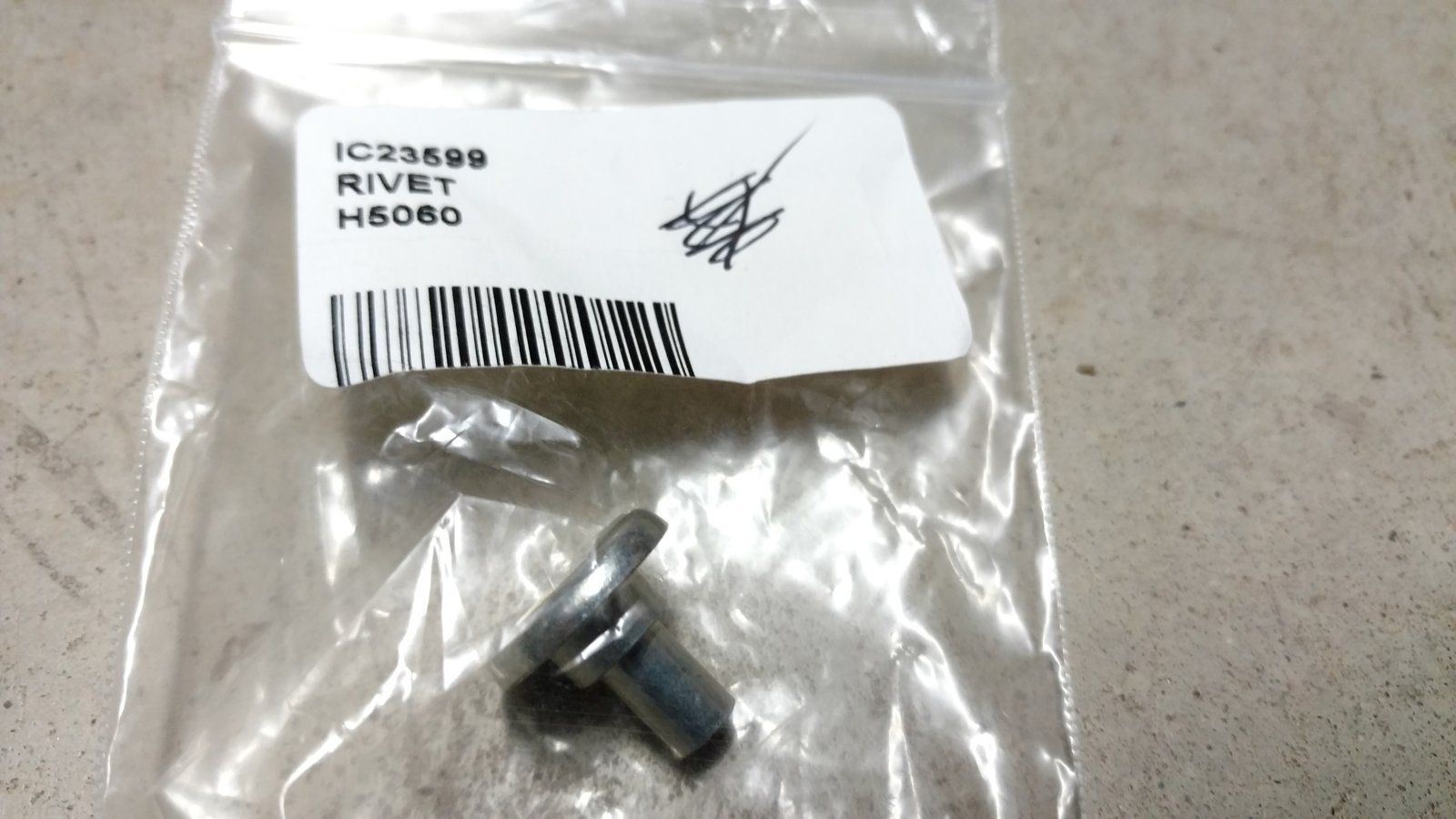 C23599 RIVET -BASKET PIVOT ZP SHOULDER - Ingersoll/Case Tractor Part