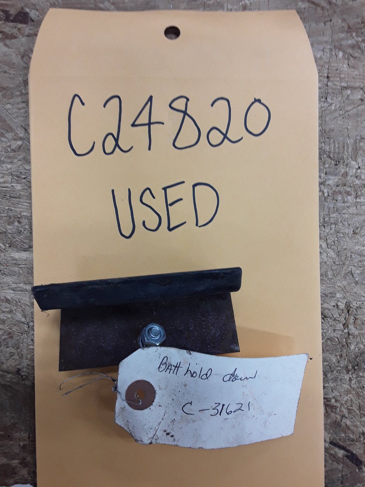 C24820 USED CLIP-BATTERY RETAINER-PLTD - Ingersoll/Case Tractor Part