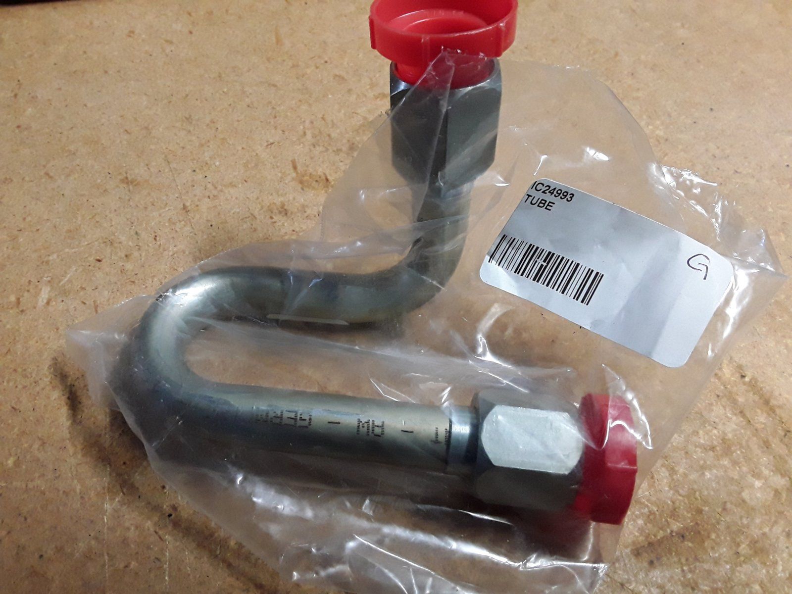 C24993 TUBE-HOLDING VALVE TO TRAVEL - Ingersoll/Case Tractor Part