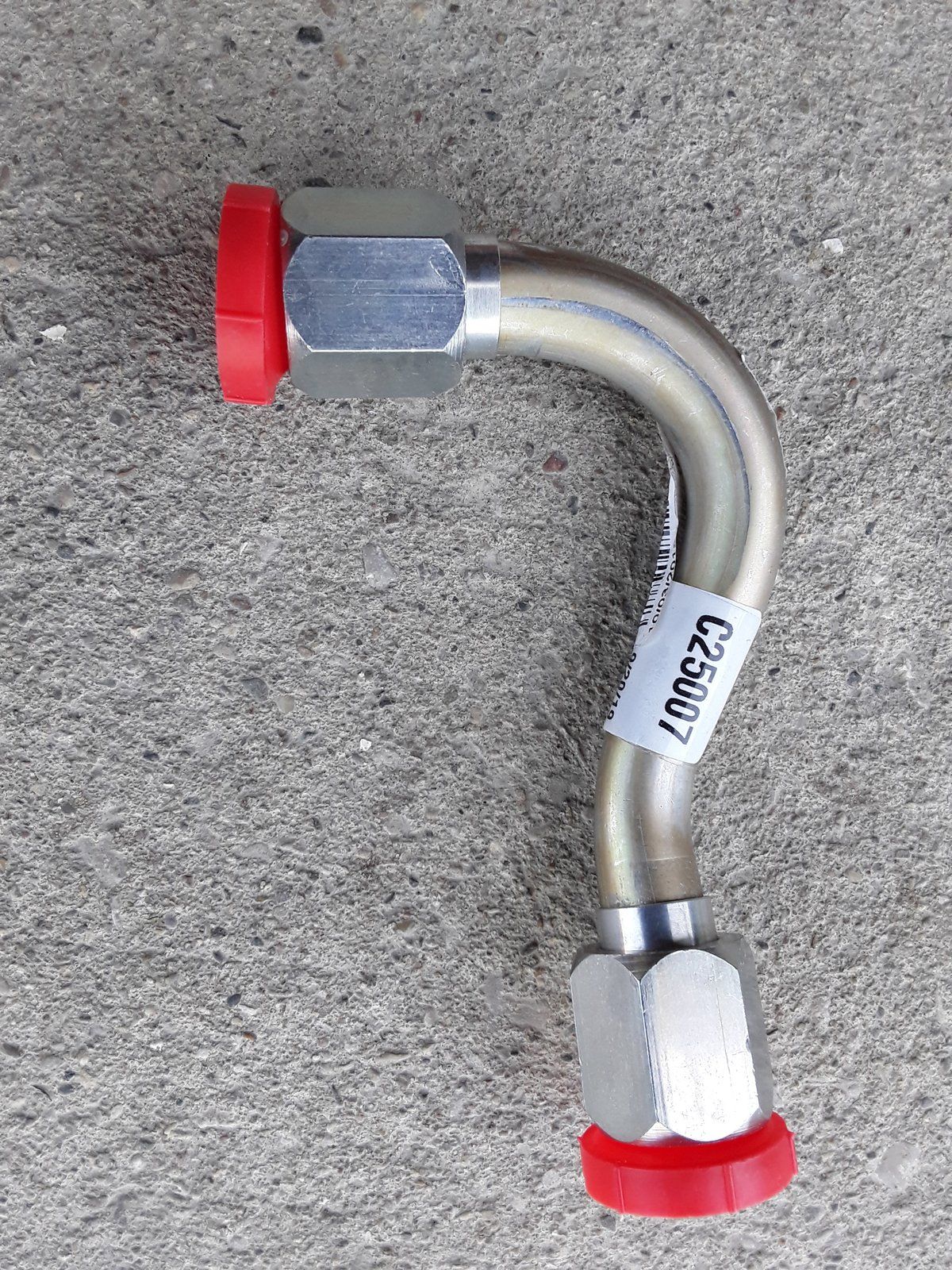 C25007 TUBE-HOLDING VALVE TO TRAVEL - Ingersoll/Case Tractor Part