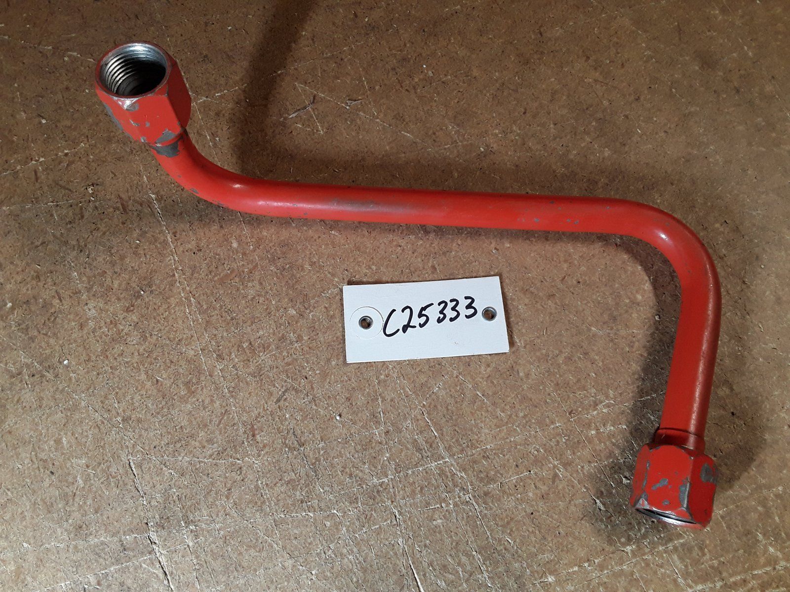 C25333 USED TUBE - VALVE TO LOWER MOTOR - Ingersoll/Case Tractor Part