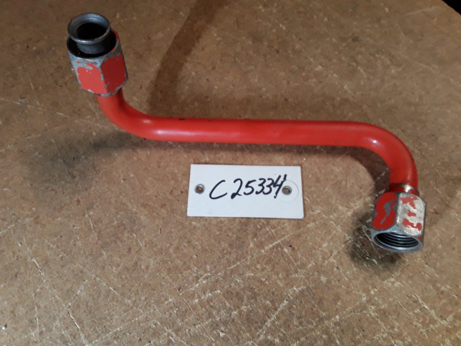 C25334 USED TUBE - VALVE TO MOTOR UPPER - Ingersoll/Case Tractor Part