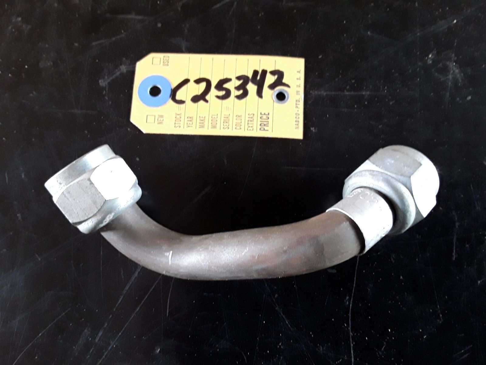 C25342 SUB TO: 218-5107 - 218-5117 - C27806 TUBE - HOLDING V. TO TRAVEL CONTROL VALVE - Ingersoll/Case Tractor Part