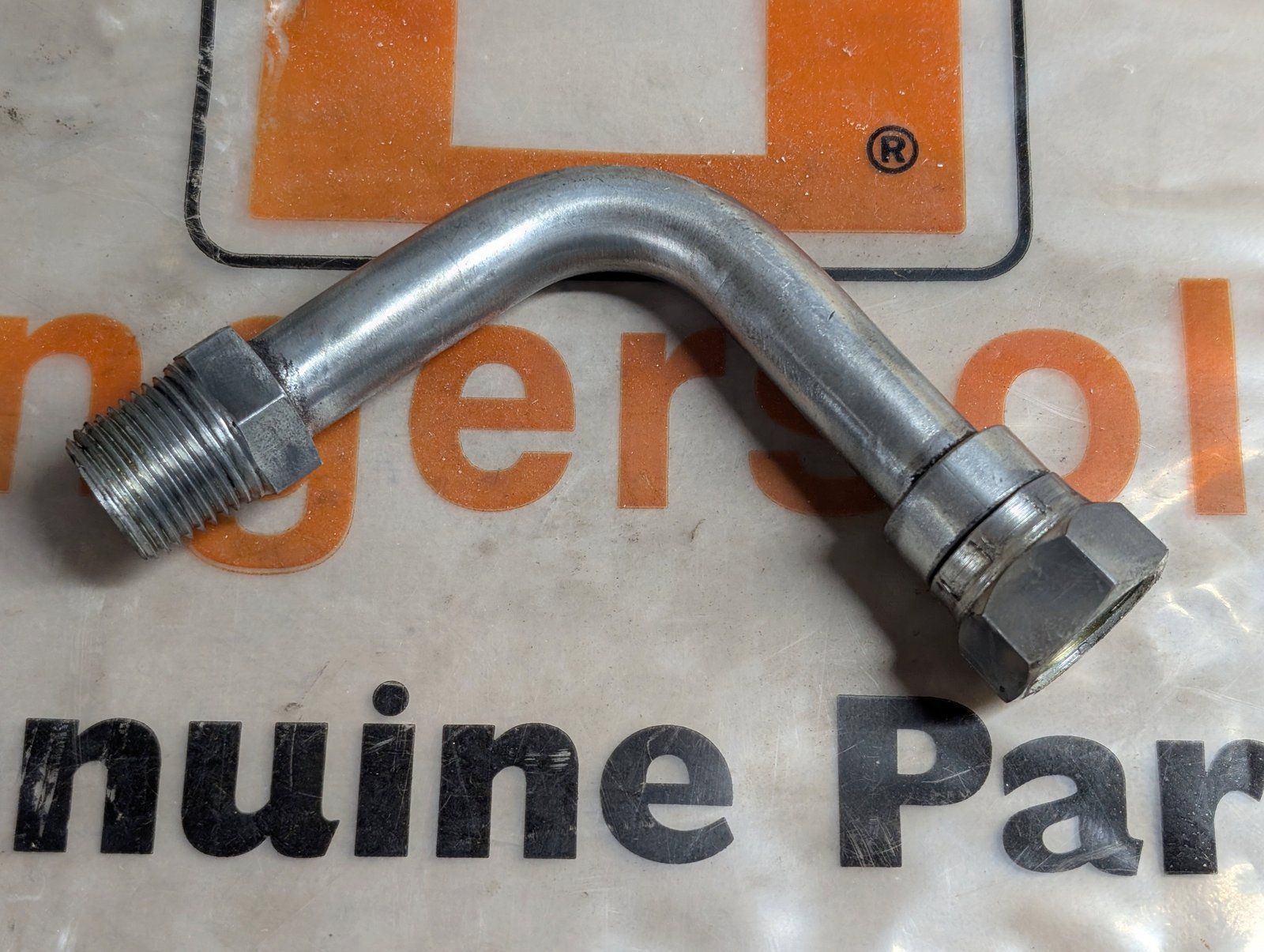 C29882 TUBE - HYDRAULIC 90 DEG 1/2P(M) X 1/2P(FM) - Ingersoll/Case Tractor Part