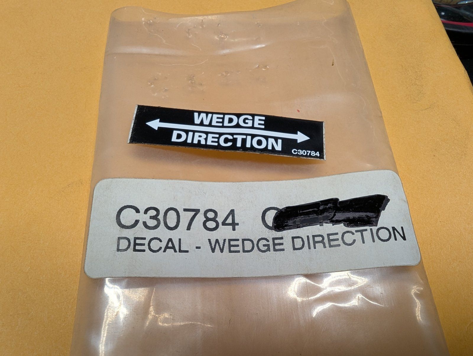 C30784 DECAL WEDGE DIRECTION - Ingersoll/Case Tractor Part