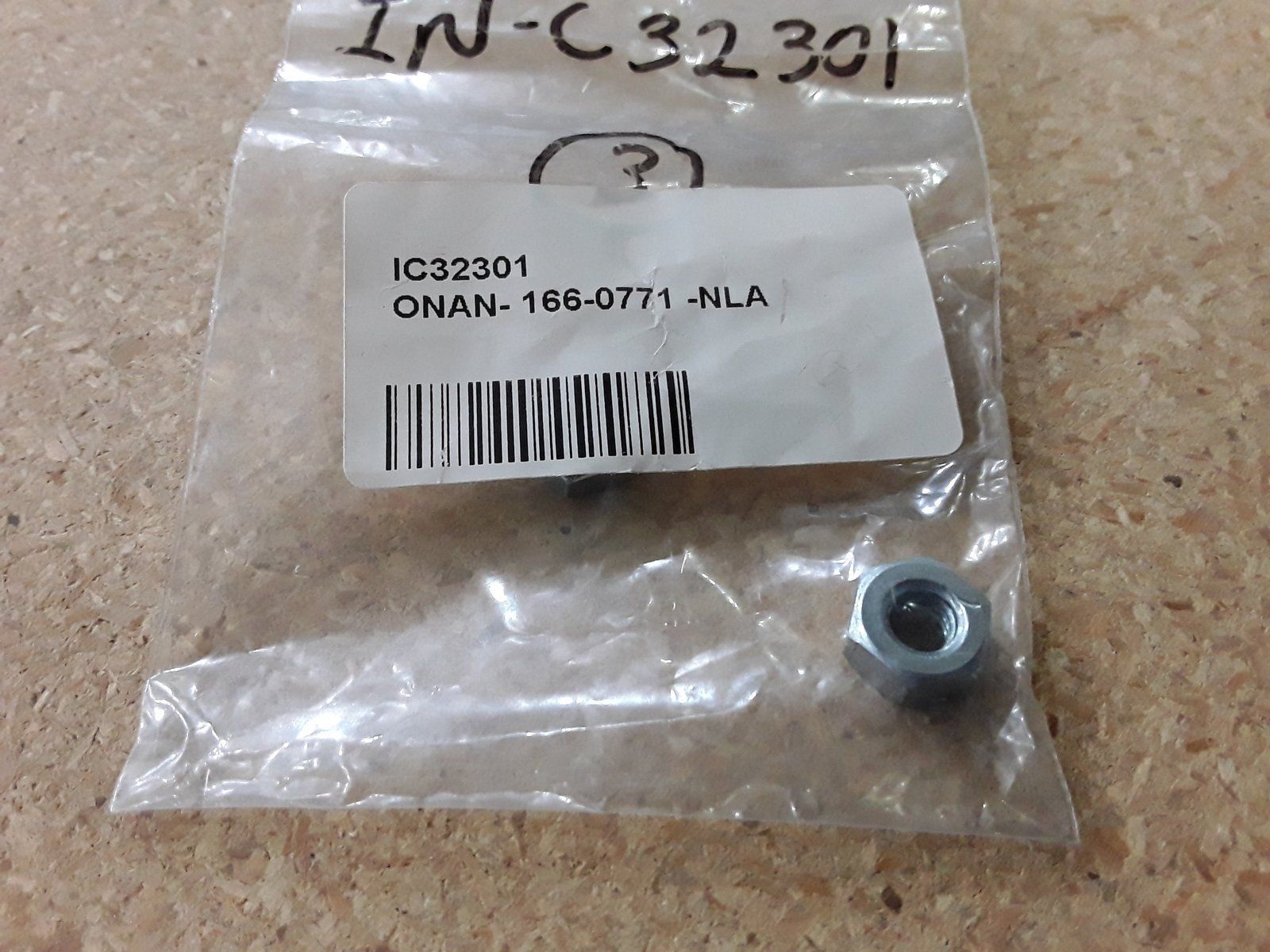 C32301 NUT ONAN 166-0771 - Ingersoll/Case Tractor Part