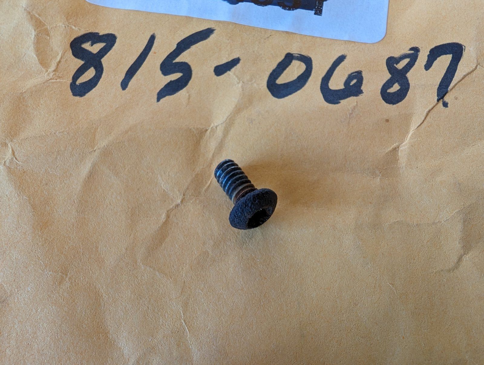 C32464 USED ONAN 815-0687 SCREW 10-24 X 3/8 FLANGE LOCK - Ingersoll/Case Tractor Part
