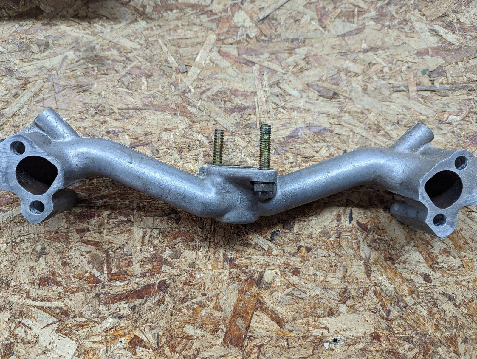 C34232 USED BRIGGS MANIFOLD - Ingersoll/Case Tractor Part