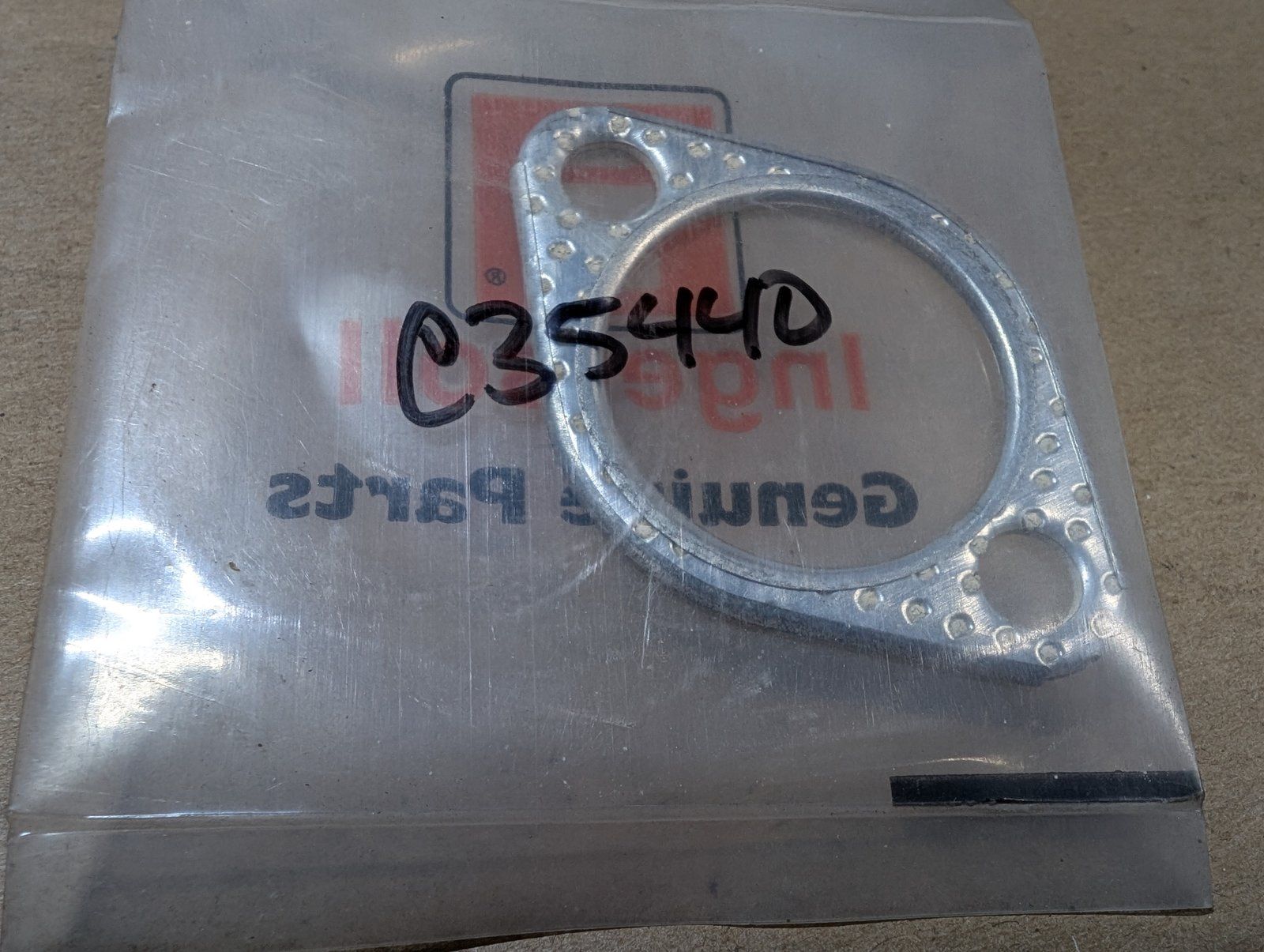 C35440 GASKET Muffler NOMA 46708 - Ingersoll/Case Tractor Part