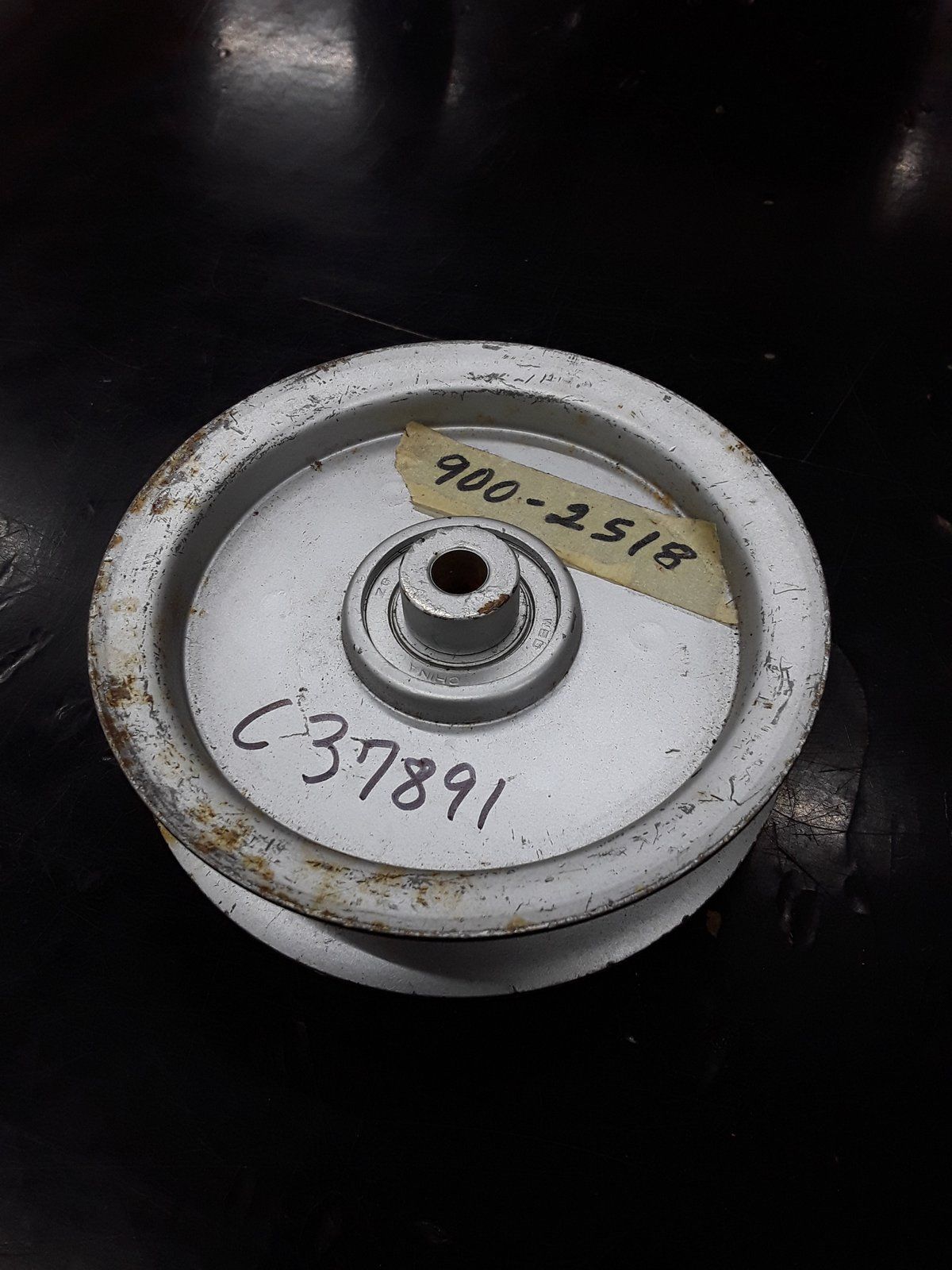 C37891 ( replaces G9002518 ) PULLEY- FLAT IDLER GRAZER 900-2518 - Ingersoll/Case Tractor Part
