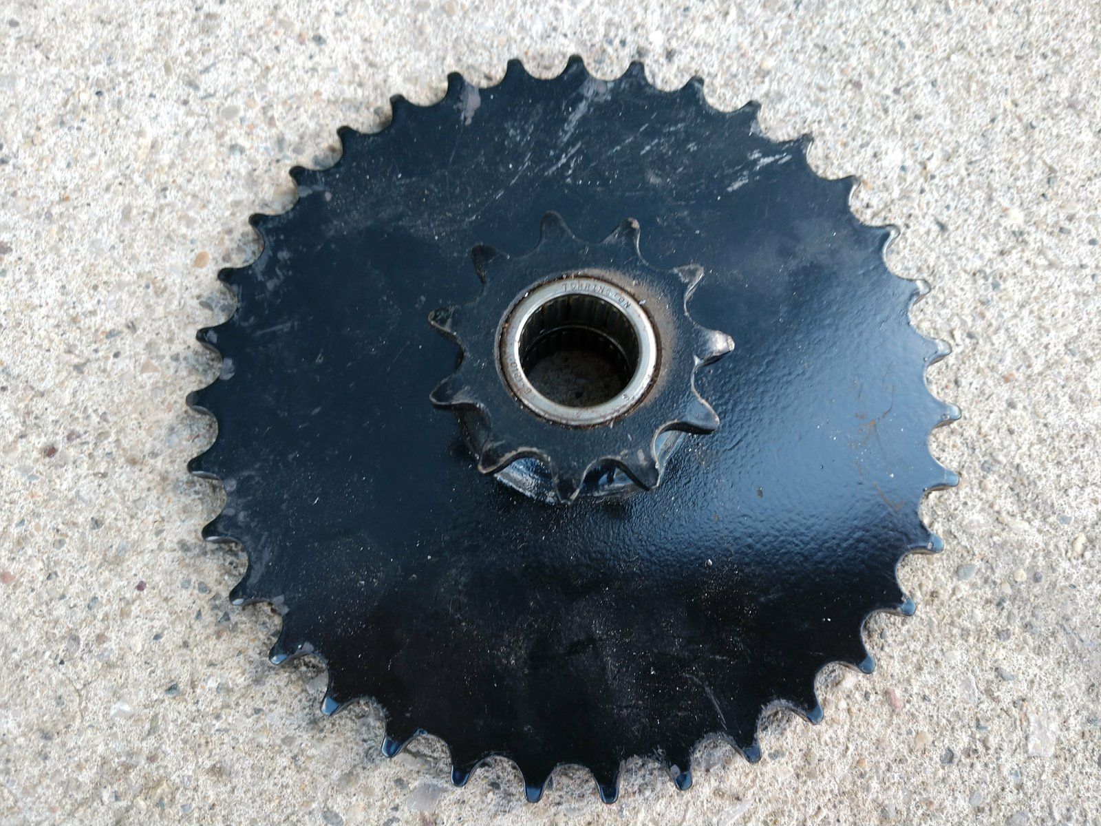 C38002 ( replaces G9011501A ) IDLER SPKT W/BRGS GRAZER - Ingersoll/Case Tractor Part