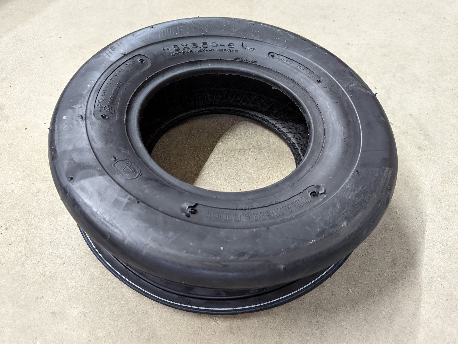 C38029 ( replaces G9004015 ) TIRE 16x6.50-8 4ply RIBBED - Ingersoll/Case Tractor Part