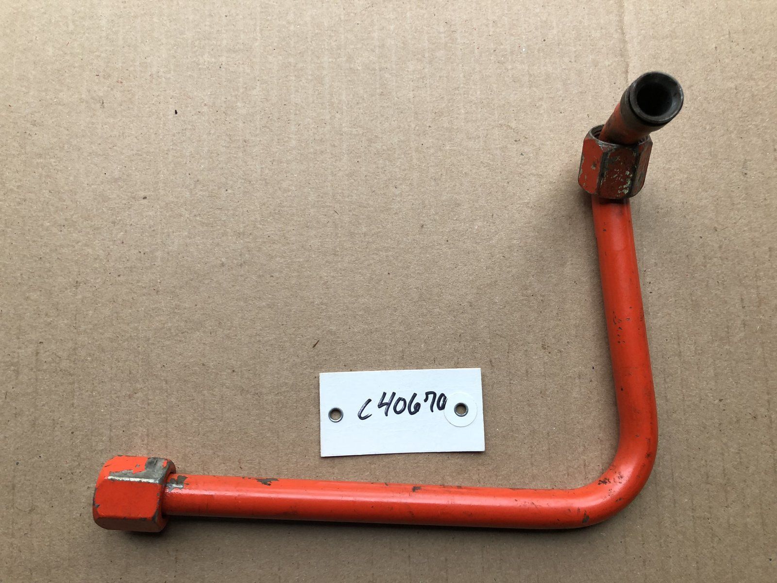 C40670 USED TUBE - PUMP TO PTO VALVE "IN" - Ingersoll/Case Tractor Part