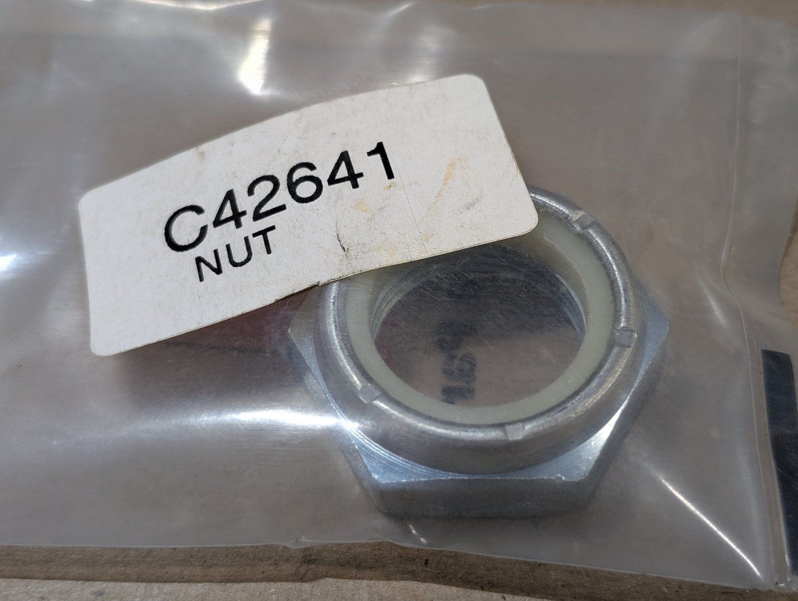 C42641 NUT JAM 1" NF NYLOC AQ7712 AMERIQUIP - Ingersoll/Case Tractor Part